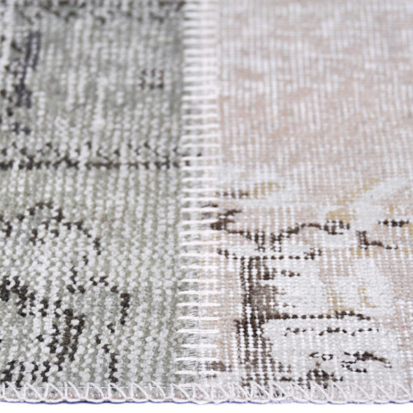 Zijkant detail aanzicht van vloerkleed ANKARA patchwork, in de kleur soft beige gemaakt van wol.