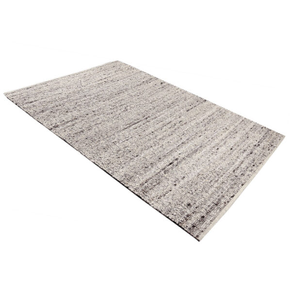 Diagonaal aanzicht van vloerkleed KELO, in de kleur ivoor bruin gemaakt van wol.