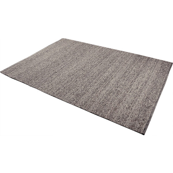 Diagonaal aanzicht van vloerkleed LUNI, in de kleur lichtbruin gemaakt van wol.