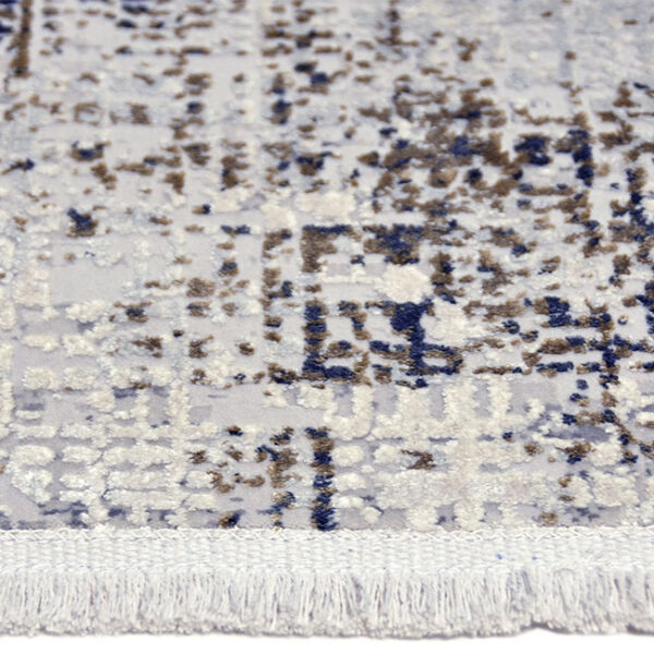 Zijkant detail aanzicht van vloerkleed OLYMPIA 20-B, in de kleur multi gemaakt van een acryl en viscose mix.