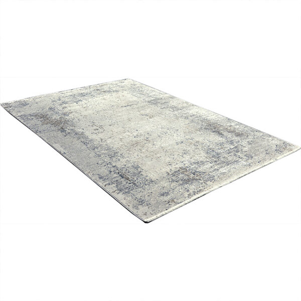 Diagonaal aanzicht van vloerkleed OLYMPIA 40-B, in de kleur multi gemaakt van een acryl en viscose mix.