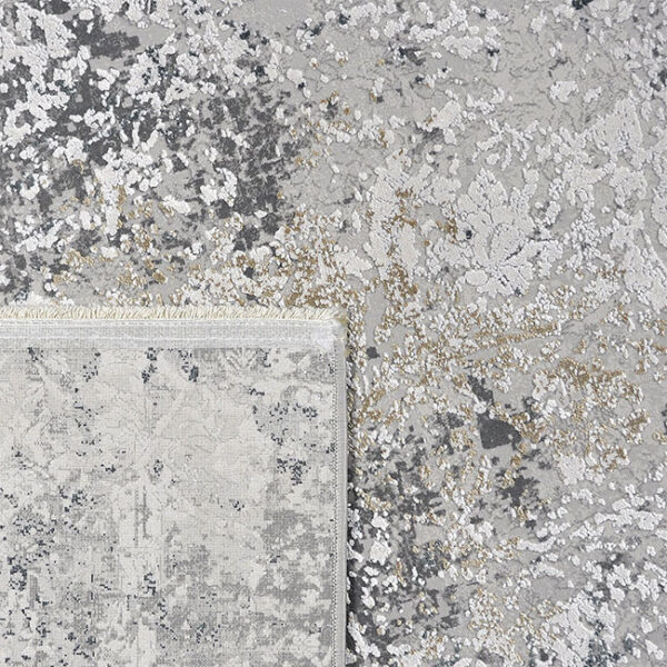 Achterkant hoek aanzicht van vloerkleed OLYMPIA 50, in de kleur multi gemaakt van een acryl en viscose mix.