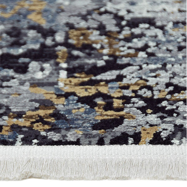 Zijkant detail aanzicht van vloerkleed OLYMPIA K-1717, in de kleur multi gemaakt van een acryl en viscose mix.