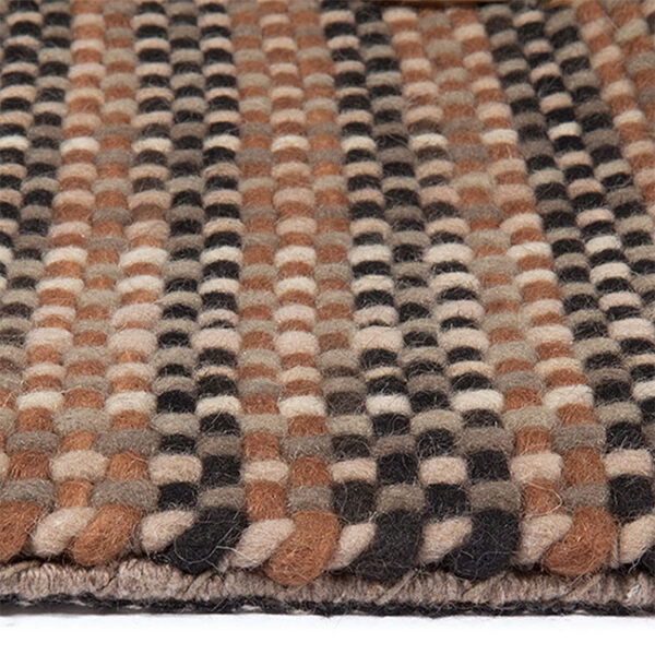 Zijkant detail aanzicht van vloerkleed PARIS, in de kleur beige bruin gemaakt van wol.v